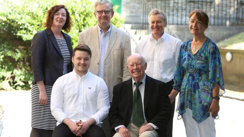 John Patrick McHugh and Gordon Snell, seated, with Margaret Kelleher, James Ryan, judge Niall MacMonagle and Éilís Ní Dhuibhne at the presentation of the Maeve Binchy Travel Award. Photograph: Jason Clarke