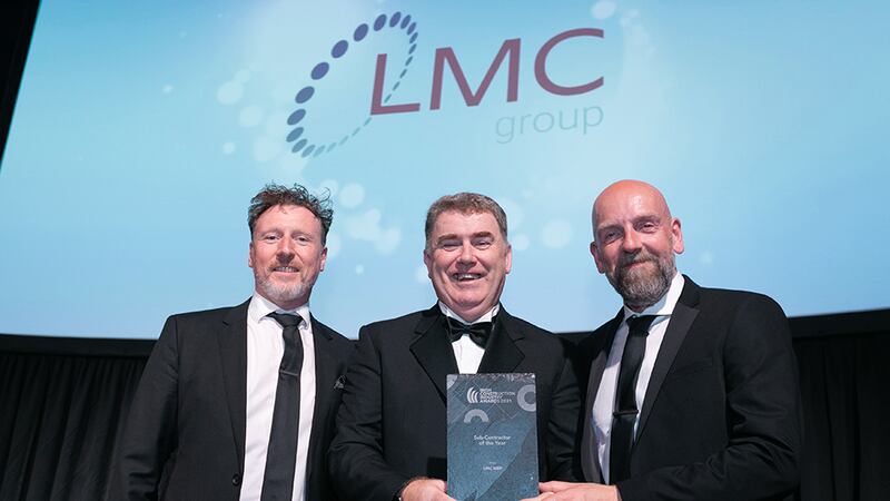 Anthony Greene, Awards Judge, presents the Sub-Contractor of the Year award to Martin Lydon & Stephen McConnell, LMC MEP.