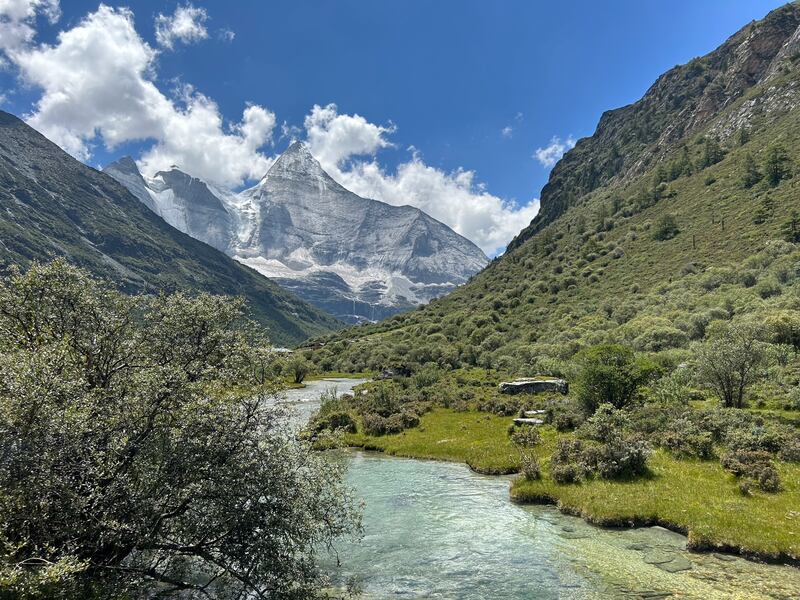 The lush Yading valley, which lies below three holy, snow-capped mountains with hanging glaciers, dense forests and shimmering lakes and streams, is said to have inspired James Hilton's novel Last Horizon. Photograph: Denis Staunton