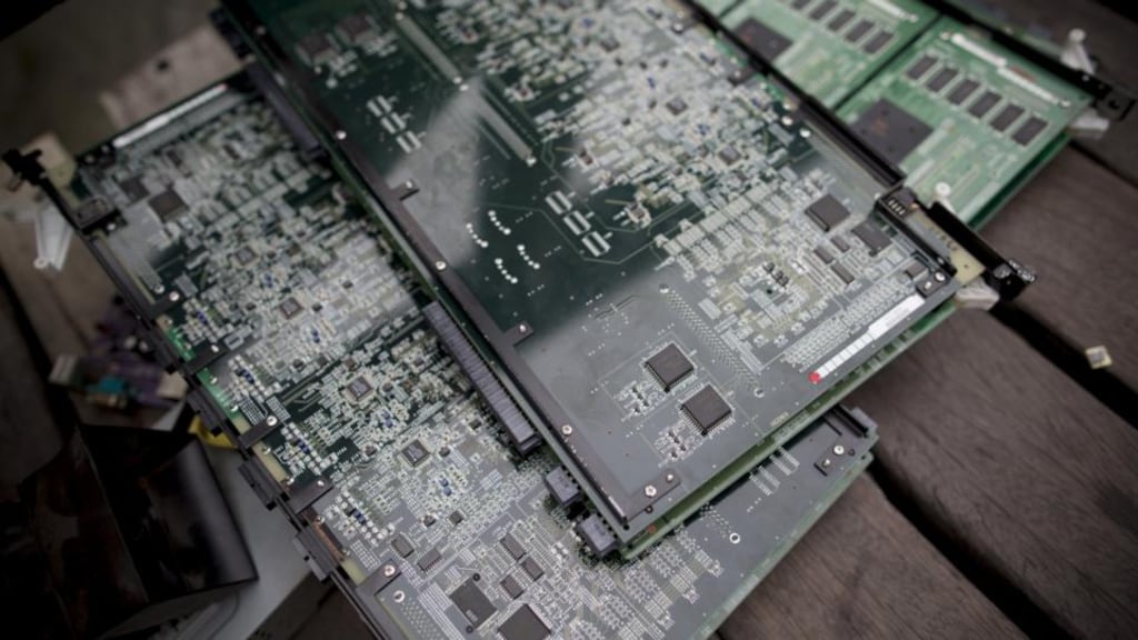 Recycled computer motherboards for sale at a roadside stall in the Tianhe district of Guangzhou, Guangdong province. PHOTOGRAPHER: BRENT LEWIN/BLOOMBERG