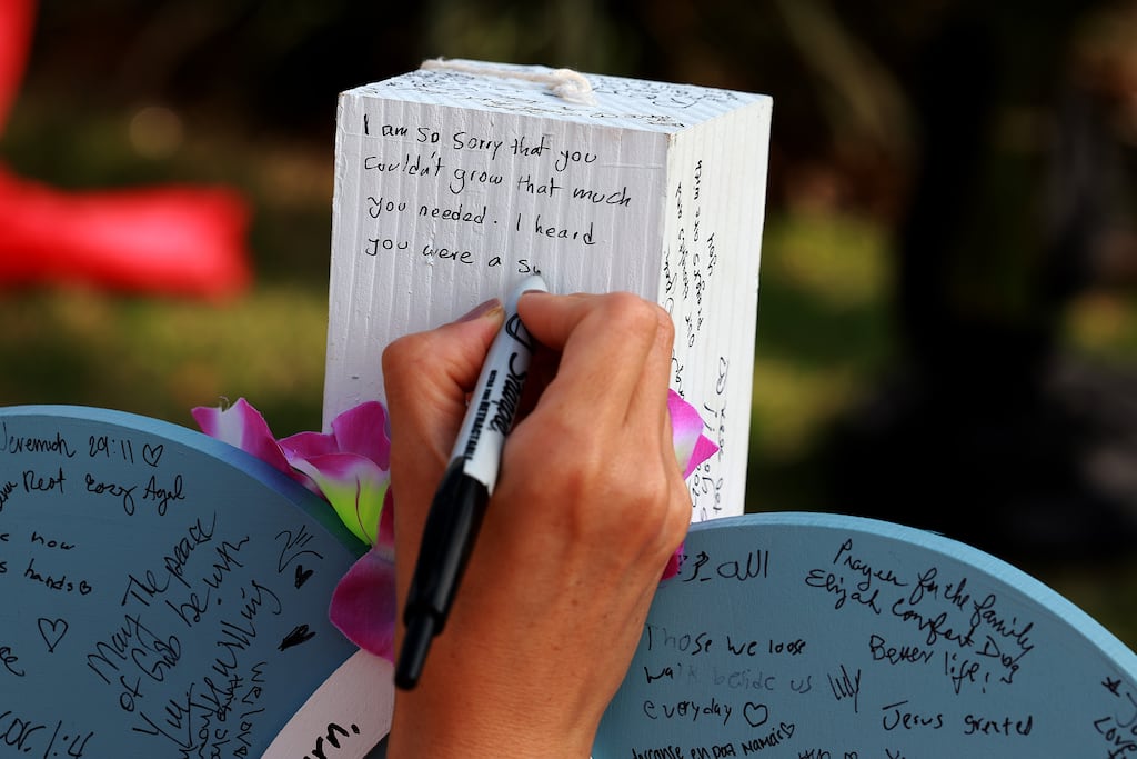 A message is written on a memorial near the scene of a mass shooting in Allen, Texas, where, as in previous cases, the gunman used a AR-15 rifle. Photograph: Joe Raedle/Getty Images