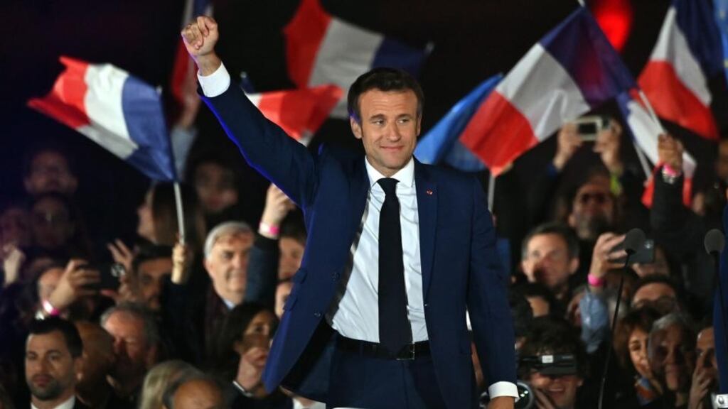 Emmanuel Macron addresses voters in front of the Eiffel Tower after beating Marine Le Pen for a second five-year term as president of France. Photograph: Aurelien Meunier/Getty Images