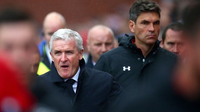 Former Stoke City manager Mark Hughes (left) has replaced Mauricio Pellegrino (right) as West Ham’s manager. Photograph: Dave Thompson/PA Wire