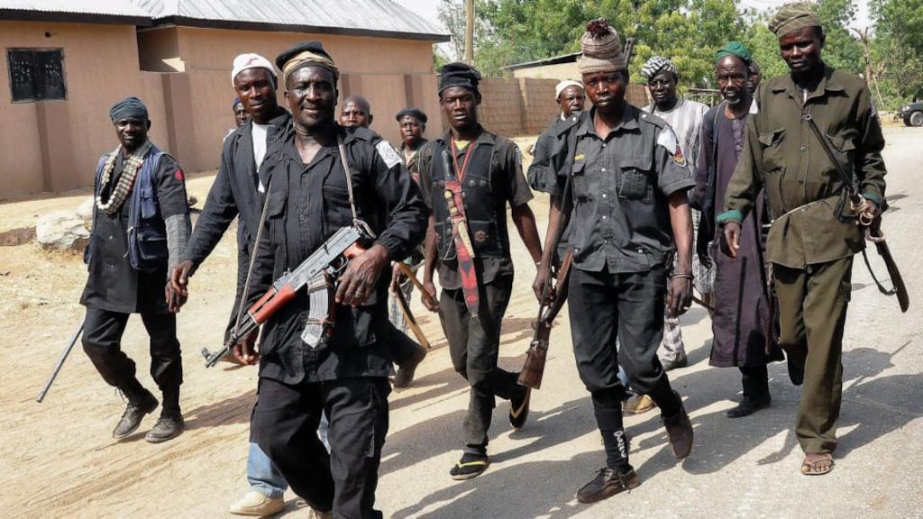 A group of Nigerian vigilantes, which comprises traditional hunters, patrol in North East Nigeria to assist the Nigerian military in fighting against Boko Haram Islamic militants. Photograph: EPA/STR