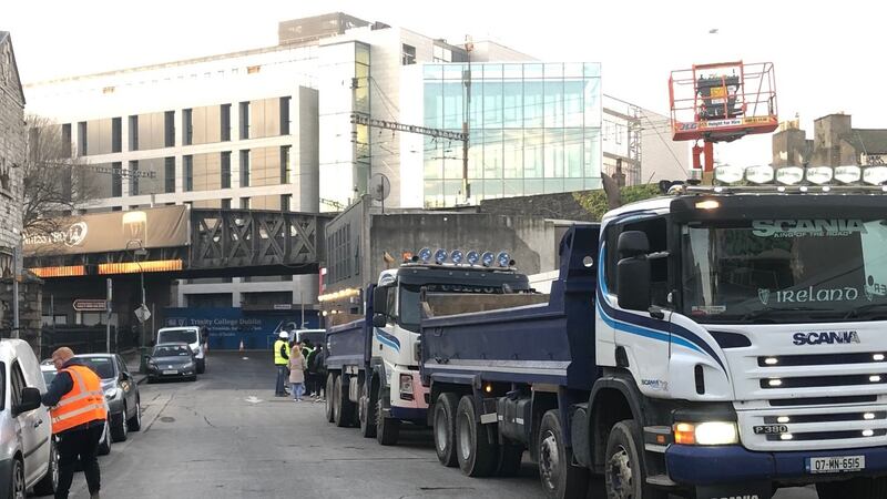 Lorries wait on Mark Street on Tuesday morning as residents block access to a building site as part of a row over traffic levels. Photograph: Tim O’Brien