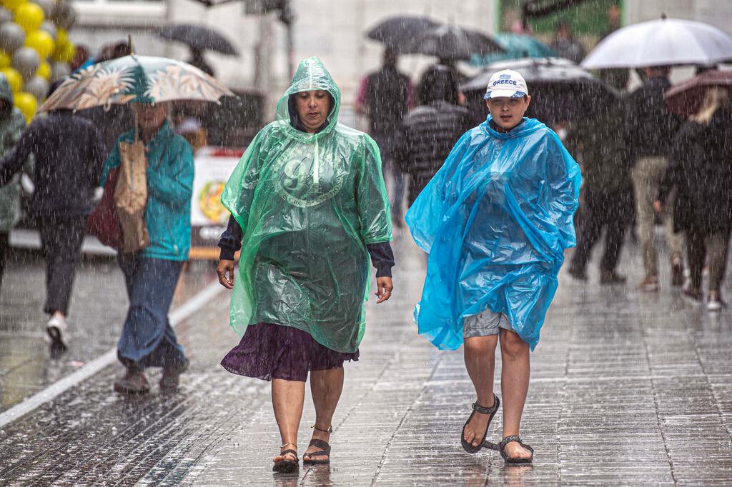 Tourists on Patrick Street in Cork City as Storm Betty hit on Friday (Photo: Michael Mac Sweeney/Provision)