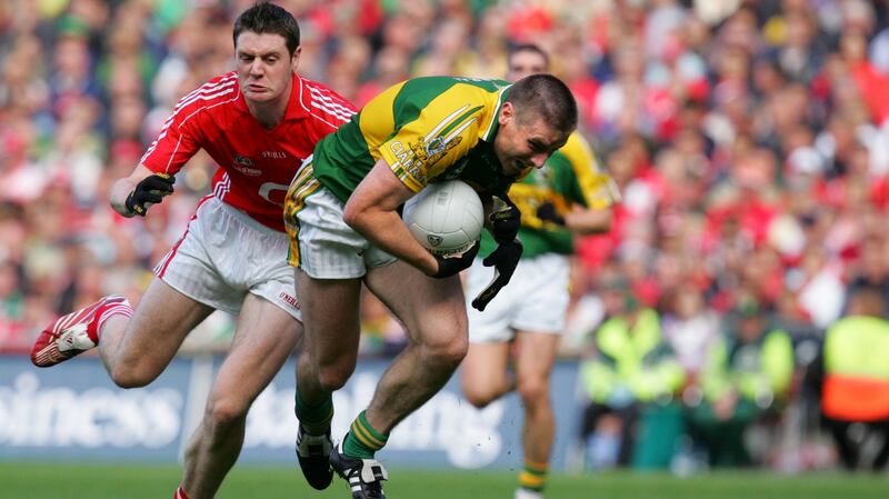 Kerry’s Darragh Ó Sé seizes the ball with Cork’s Michael Cussen in hot pursuit during the All-Ireland football final at Croke Park on September 16th, 2007. Photograph: Kate Geraghty