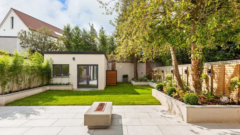 Back garden with patio and separate office