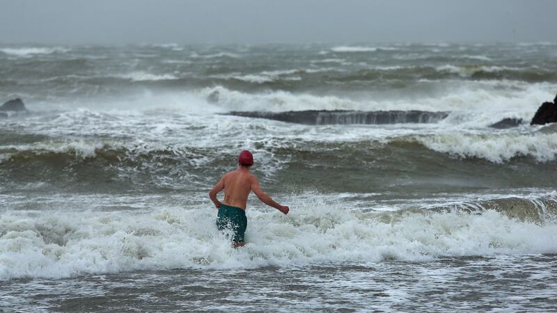 A swimmer braves the elements while taking a dip off Salthill beach in Galway, December 4th, 2015. Photograph: Joe O’Shaughnessy