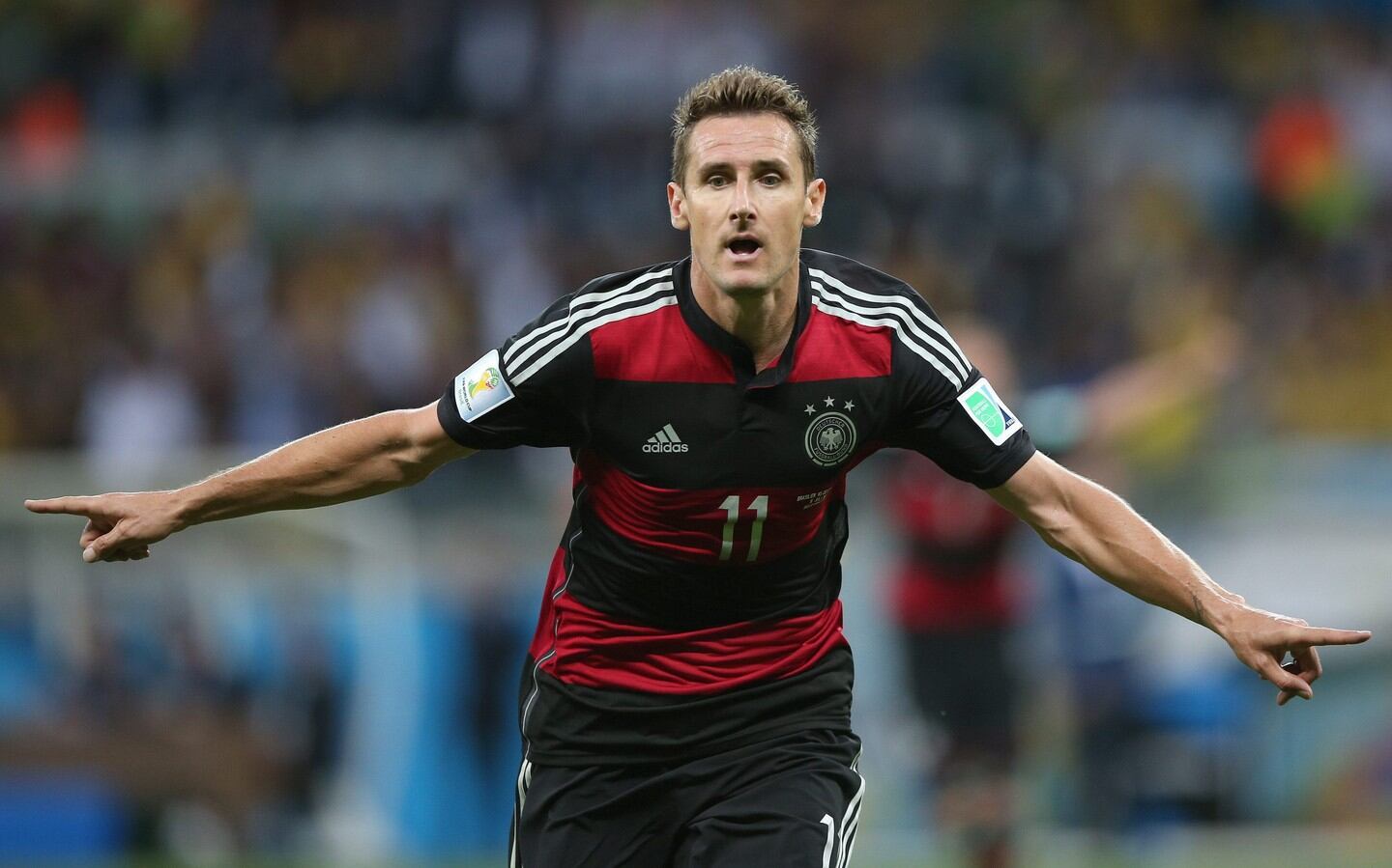 Miroslav Klose of Germany celebrates after becoming the highest ever goalscorer in World Cup history with the 16th of his career at the Estadio Mineirao in Belo Horizonte. Photograph: Fernando Bizerra Jr. / EPA