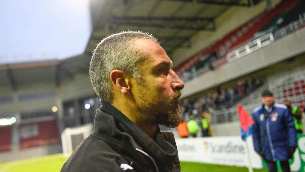 Helsingborg coach Henrik Larsson leaves the pitch after losing to Halmstad. Photo: EPA