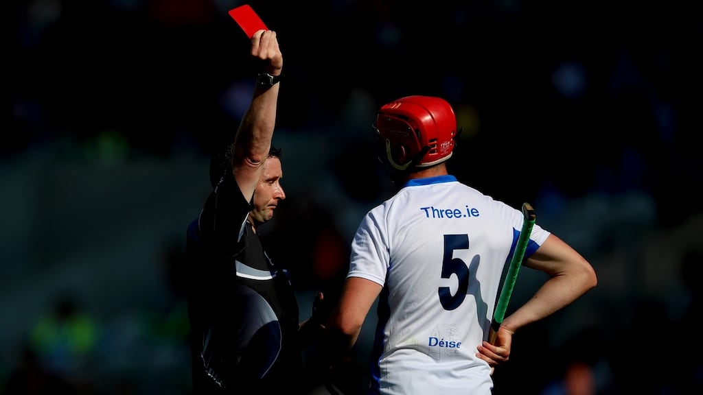 Referee Fergal Horgan sends off Waterford’s Tadhg de Búrca during the All-Ireland quarter-final against Wexford. Photograph: James Crombie/Inpho