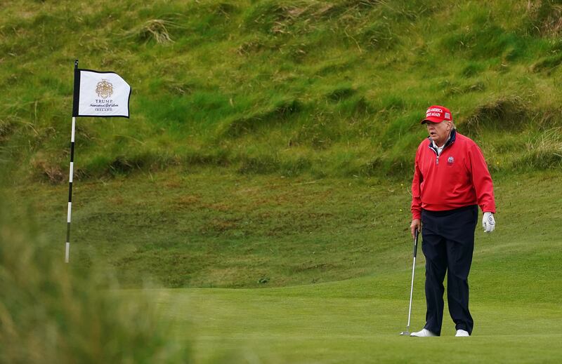 Donald Trump playing golf at Trump International Golf Links & Hotel in Doonbeg, Co Clare, during his visit to Ireland in 2023. Photograph: Brian Lawless/PA Wire