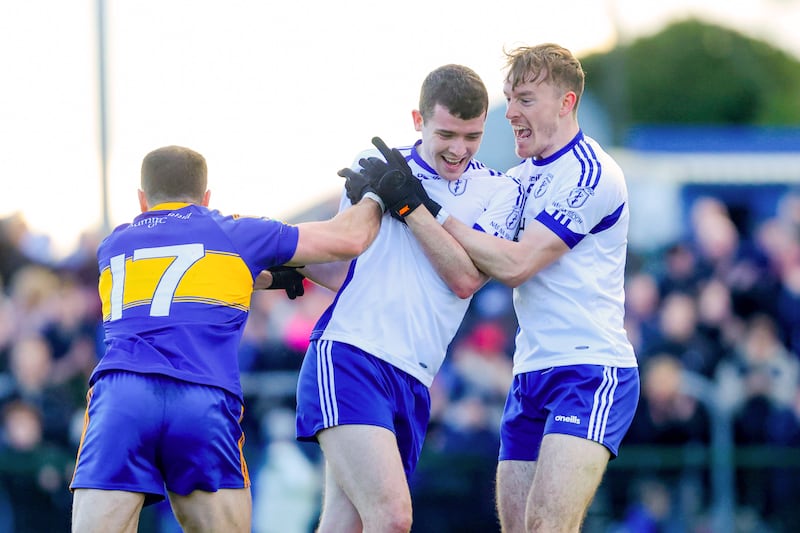 Naas's Eoghan Prizeman celebrates scoring a goal with Paddy McDermott. Photograph: Bryan Keane/Inpho