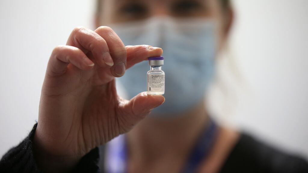 Vaccinator gets ready to administer the Pfizer Covid-19 vaccine at the Helix mass vaccination centre in DCU. Photograph: Laura Hutton / The Irish Times.