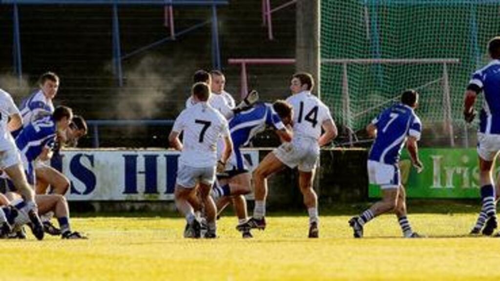 A mass brawl erupts between Laois and Kildare players shortly before half-time in Sunday's O'Bryne Cup quarter-final at Moore Park, Portlaoise, which resulted in five players receiving a red card. Two more players were sent off later in the match. - (Photograph: Inpho)