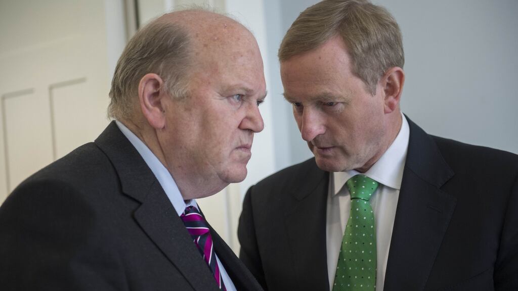 Taoiseach Enda Kenny (right) with Minister for Finance Michael Noonan. File photograph: Brenda Fitzsimons/The Irish Times