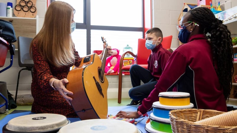 Pictured, left to right, are Jess O’Donoghue, music therapist at Corpus Christi, Moyross, Limerick, with fifth class pupils, Semilore Ade-John and Aaron Troy Conway at the school’s wellness hub. Photograph: Alan Place