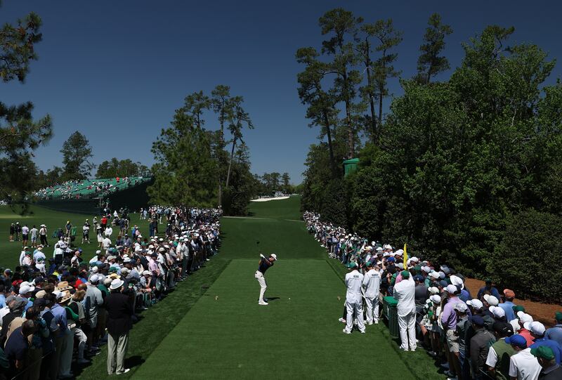 Rory McIlroy of Northern Ireland plays his shot from the 18th tee during a practice round. Photograph: Richard Heathcote/Getty