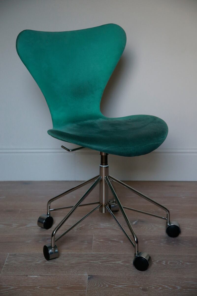 One  of the three things Niamh loves most is her Arne Jacobsen Series 7 swivel chair in green suedette. Photograph Nick Bradshaw