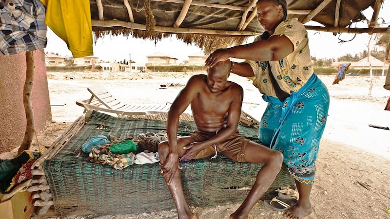 A salt harvester at Lac Rose prepares for a long day’s work. Photograph: Lar Boland