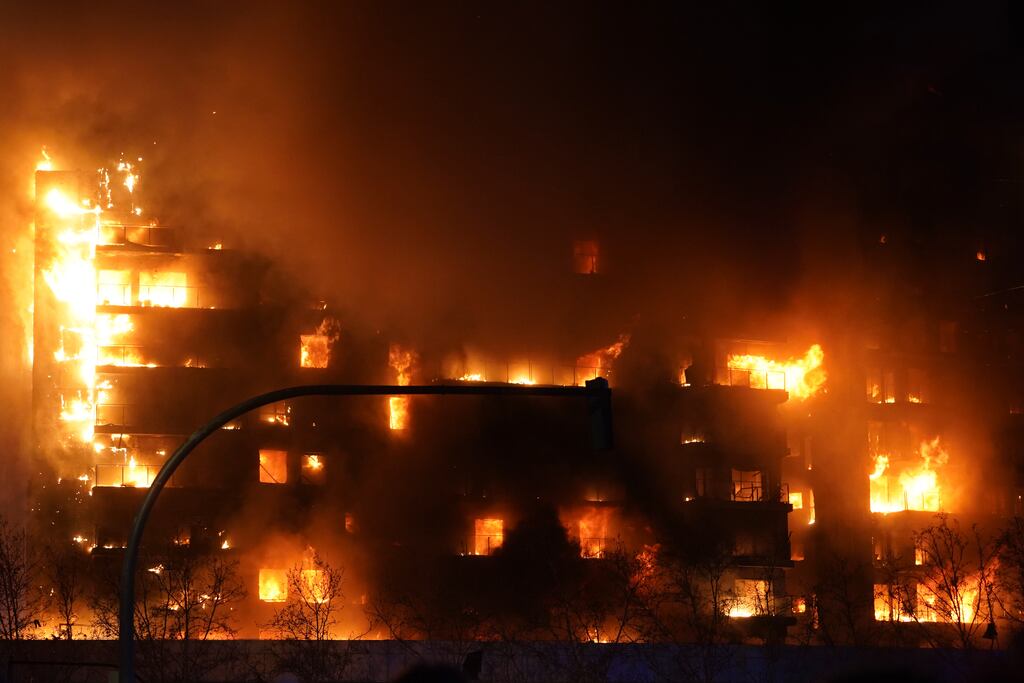 The fire in Valencia spread to another building. Photograph: Alberto Saiz/AP