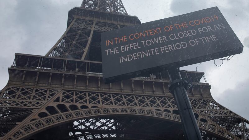 A sign notifies the closure of the Eiffel Tower in Paris, France, as part of measures to contain the spread of coronavirus. Photograph: Ian Langsdon/EPA