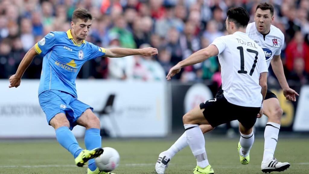 Richie Towell and Brian Gartland of Dundalk in action against Aliaksandr Karnitski of BATE Borisov in the Champions League second qualifying round, second leg at Oriel Park. Photograph: James Crombie/Inpho