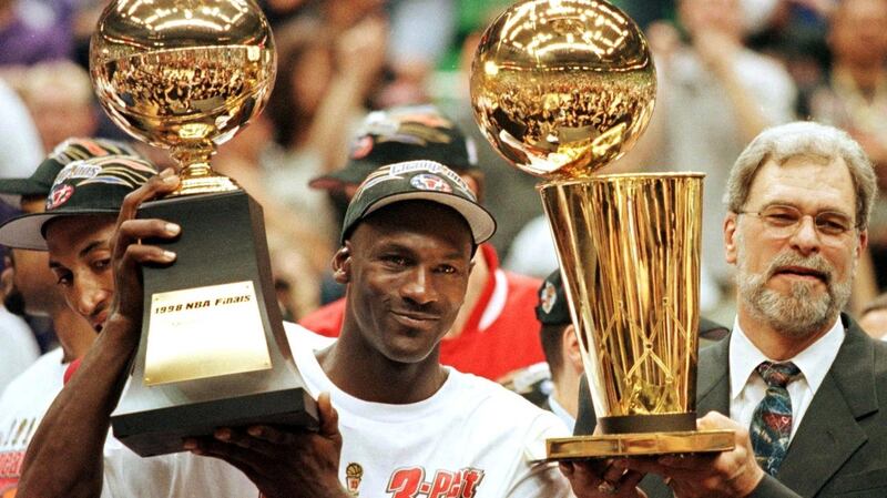 Michael Jordan and Phil Jackson celebrate the Bulls’ last NBA finals win in 1998. Photograph: Jeff Haynes/Getty/AFP