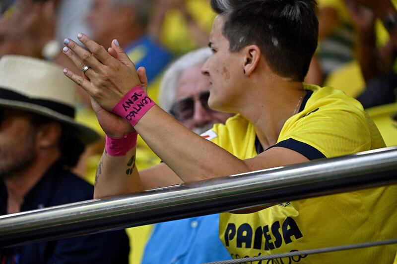A supporter bears a wrist ribbon in support of Spain's midfielder Jennifer Hermoso amid widespread outrage over an unsolicited kiss on her lips by Luis Rubiales. Photograph: Javier Soriano/AFP/Getty
