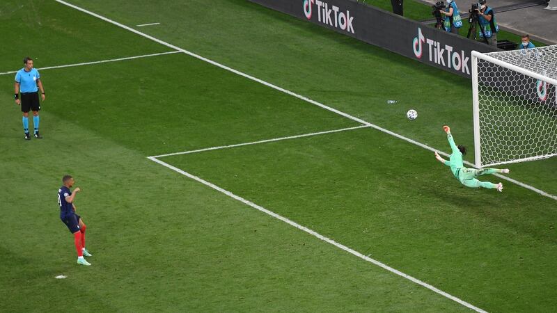 Yann Sommer of Switzerland saves Kylian Mbappe’s penalty in Bucharest. Photograph: Mihai Barbu/Getty Images