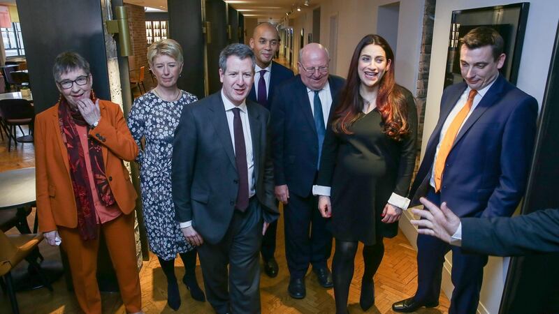 Former Labour party MPs, (L-R) Ann Coffey, Angela Smith, Chris Leslie, Chuka Umunna, Mike Gapes, Luciana Berger, and Gavin Shuker pose for a photograph following a press conference in London on February 18, 2019, where they announced their resignation from the Labour Party, and the formation of a new independent group of MPs. DANIEL LEAL-OLIVAS/AFP/Getty Images
