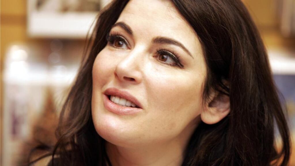 Nigella Lawson: when she gets tired of teaching the world how to make maple buttercream cup cakes she could teach puffed up MBAs how to deal gracefully with humiliation. Photograph: Dara Mac Dónaill