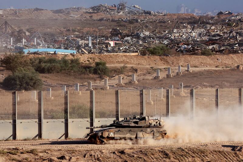 An Israeli army tank photographed along the separation fence on the border with the Gaza Strip in southern Israel, on September 3rd. Photograph: Jack Guez/ AFP via Getty Images