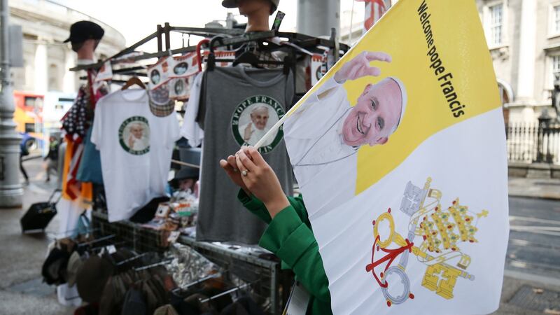 T-Shirts and flags of Pope Francis on sale in Dublin, ahead of this weekend’s visit by Pope Francis. Photograph: Aaron Chown/PA Wire