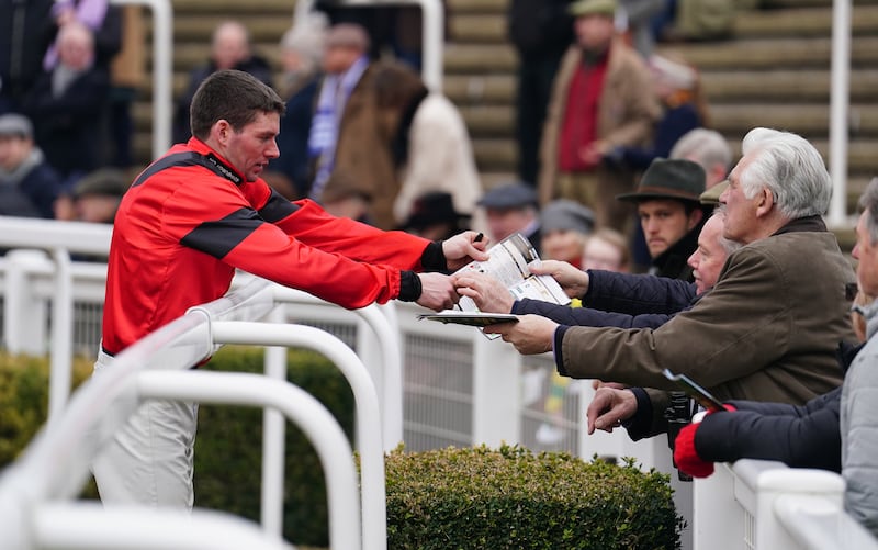 Jockey Derek Fox signs autographs during Festival Trials Day at Cheltenham in January. 'He's a fantastic horsemen,' says Peter Scudamore. Photograph: David Daview
