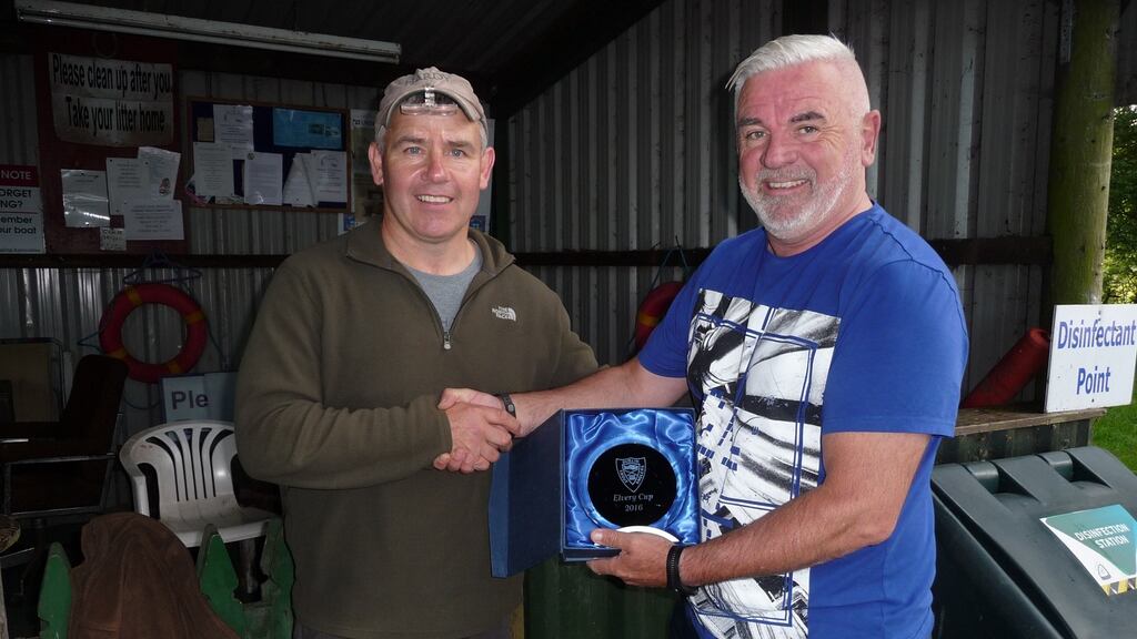 Willie Scully (right, winner) receiving the Elvery Cup from Dublin Trout Anglers’ secretary Frank Nugent at Lough Lene