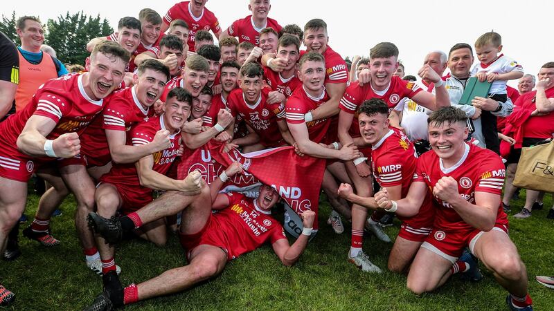 The Tyrone Under-20s team celebrate after the game. Photograph: Lorraine O’Sullivan/Inpho