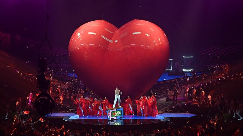 Lebanese-British singer-songwriter and co-host Mika performs during an interlude. Photograph: EPA/Alessandro di Marco