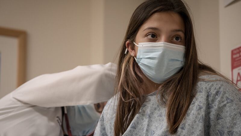 Dr Jane Newburger listens to Sierra Trudeau’s chest during an appointment at Boston Children’s Hospital. Photograph: Maddie Malhotra/The New York Times