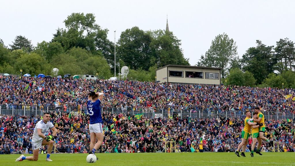 Cavan’s goalkeeper Raymond Galligan and Pádraig Faulkner look dejected as Donegal’s Patrick McBrearty, Jamie Brennan and Ryan McHugh celebrate their Ulster final triumph. Photograph: James Crombie/Inpho