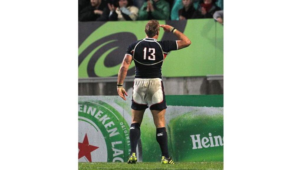 Paul Emerick salutes the crowd after scoring his side's try late in the game. Photograph: Lynne Cameron/PA Wire.