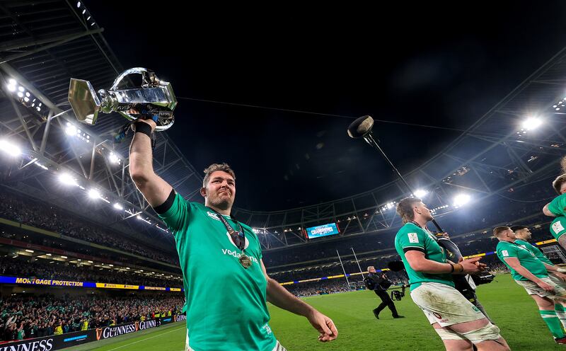 Peter O’Mahony shows off the Six Nations trophy, maybe, or maybe not, for the last time. Photograph: Dan Sheridan/Inpho