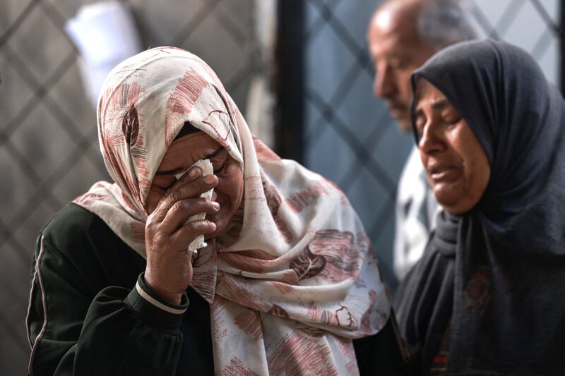 Palestinians at al Najar hospital in Rafah mourn relatives killed during Israeli bombardment of the Gaza Strip. Photograph: AFP/Getty