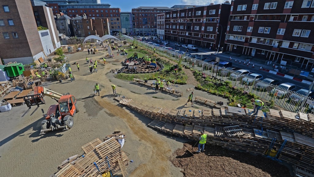 Volunteers putting the final touches to “Granby Park”, a pop-up park on the  Dominick Street flats site which opened in August 2013.  File photograph: Dara Mac Dónaill/The Irish Times