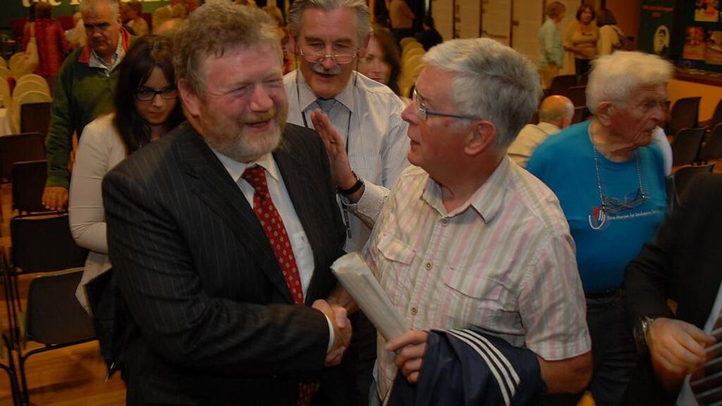 Minister for Health James Reilly having a laugh with John Colgan from Dublin at the MacGill summer school in Glenties yesterday. Photograph: Michael O Donnell.