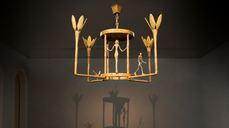 At Sothebys: ‘Lustre avec femme, homme et oiseau’ (a bronze chandelier sculpture with figures of a man, a woman and a bird) by Alberto Giacometti £6 million-£8 million