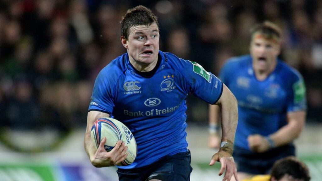 Leinster’s Brian O’Driscoll runs in to score a try against Northampton. Photograph: Tony Marshall/PA Wire
