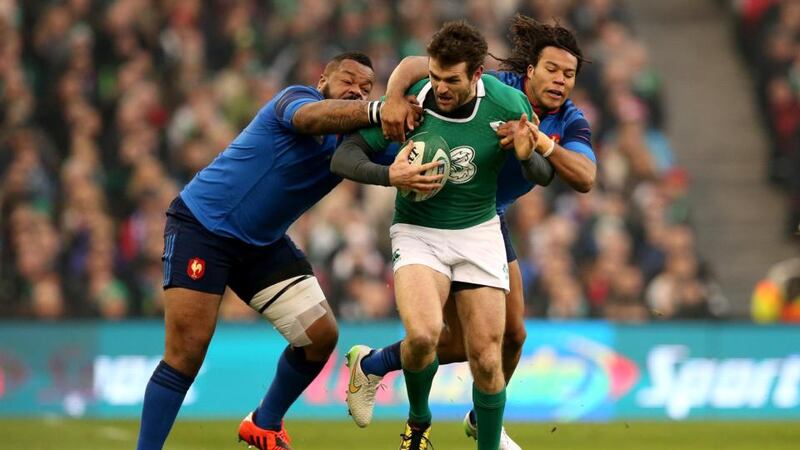 Tangled up in blue: Jared Payne is part of a brand new midfield combination that is struggling to throw of the shackles in the post O’Driscoll era.  Photograph: Ryan Byrne/INPHO