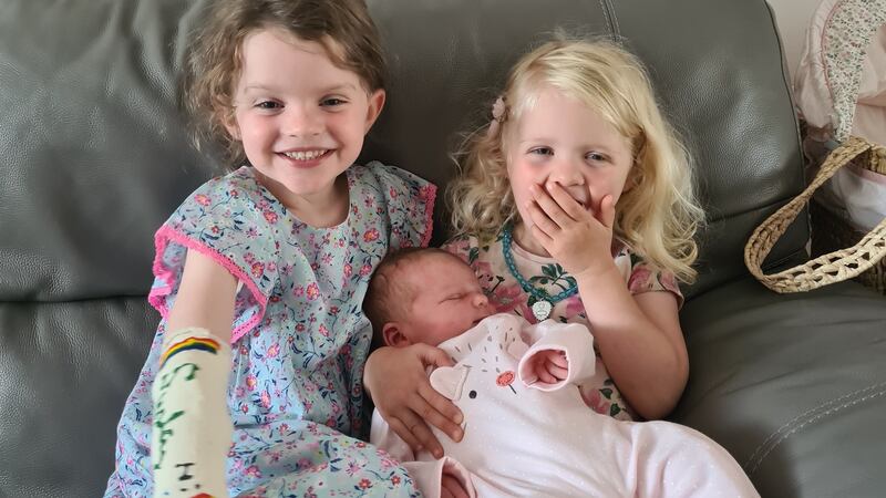 Corlaith, baby Caoimhe and Saorla Leahy. The girls meeting baby Caoimhe for the first time